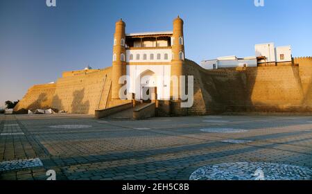 evening view of fortres Ark - Ark entrance - City of Bukhara - Uzbekistan Stock Photo