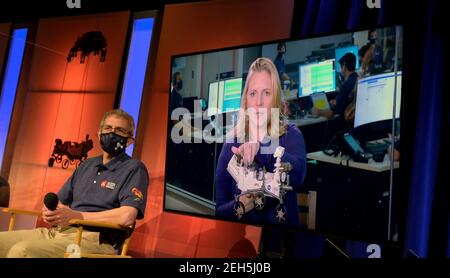 Pasadena, United States Of America. 18th Feb, 2021. Perseverance deputy project manager, JPL, Jennifer Trosper, right monitor, during a mission post-landing update press conference at the NASA Jet Propulsion Laboratory February 18, 2021 in Pasadena, California. The Perseverance Mars rover landed successfully and immediately began sending data back to Earth. Credit: Planetpix/Alamy Live News Stock Photo