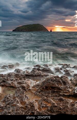 Puffin Island under stormy skies, Anglesey, North Wales Stock Photo