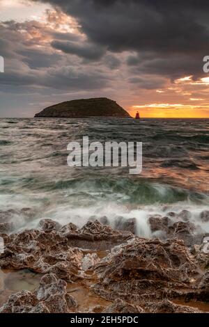Puffin Island under stormy skies, Anglesey, North Wales Stock Photo
