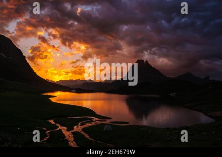 Sunrise at Pic du Midi d'Ossau and Gentau Lake (Pyrénés Atlantiques, Pyrenees, France) Stock Photo