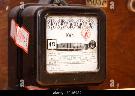 LONDON, UK - January 23, 2012. Analogue electricity meter, old domestic electric meter with dials, UK Stock Photo