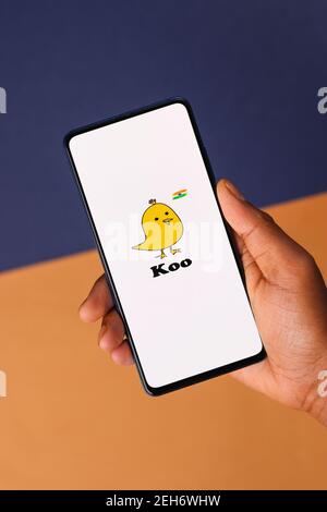 Assam, india - February 19, 2021 : Koo app logo on phone screen stock image. Stock Photo