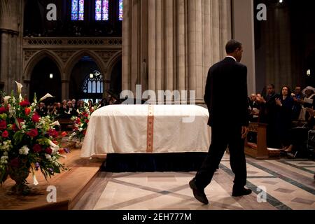President Barack Obama returns to his seat after delivering the eulogy at the funeral for Dorothy Height at Washington National Cathedral in Washington, D.C., April 29, 2010. Stock Photo