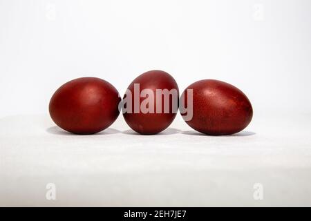 three colored for Easter eggs on white background Stock Photo