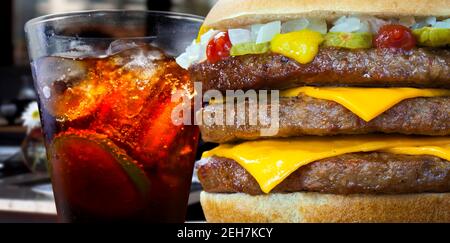 triple hamburger with soda cola Stock Photo