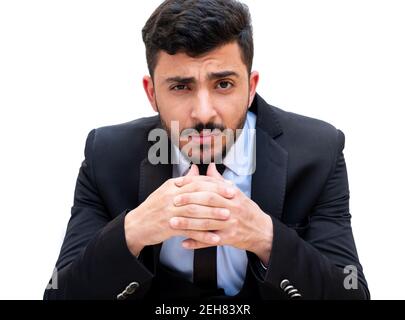 Cheerful young guy wearing tuxedo with high confidence and ready for the next Stock Photo