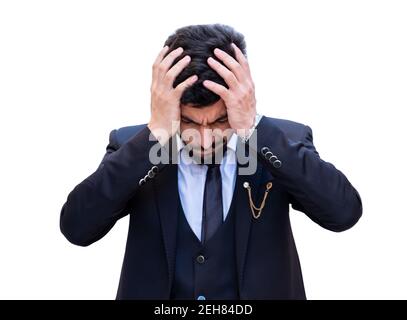 Arabic business man holding his head  having a headache from the overload and stress Stock Photo