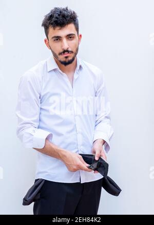 Arabian businessman full of depts nad need some help to stand up again for the fighting of the poverty and unemployment in the 21st century Stock Photo