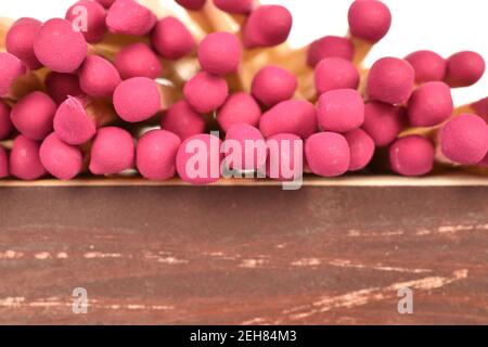 One paper box with wooden matches on a white background. Stock Photo