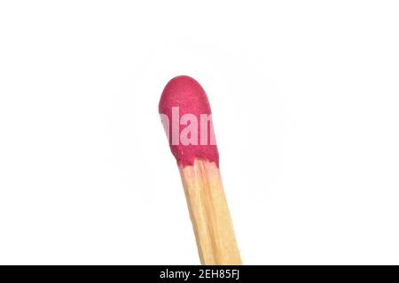 One wooden match, close-up, on a white background. Stock Photo