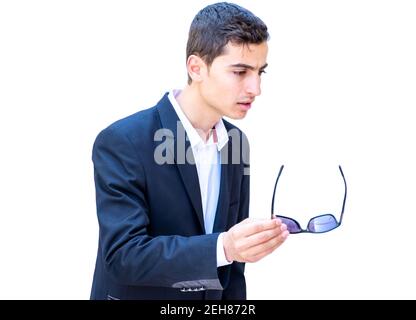 Arabic businessman holding sunglasses in his hand Stock Photo