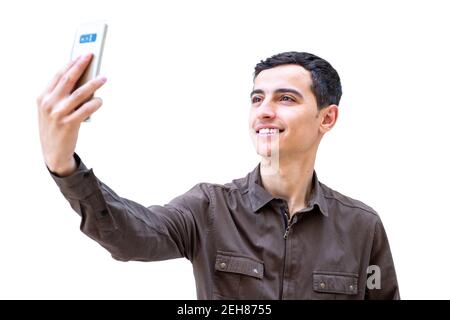 Arabic guy using smartphone to make a call Stock Photo