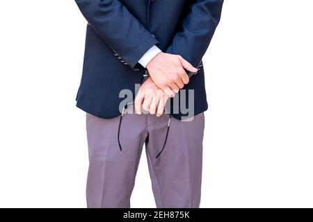Arabic businessman holding sunglasses in his hand Stock Photo