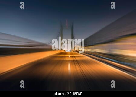 Night view of the Vincent Thomas Bridge with motion blur near San Pedro in Los Angeles, California. Stock Photo