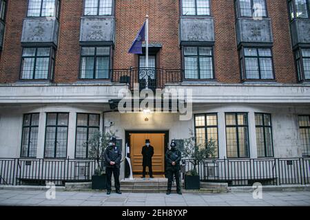 LONDON, UK 19 February 2021. Police officers  and a doorman in a top hat guard the front door of the King Edward VII hospital where  HRH Prince Philip, Duke of Edinburgh aged 99 years old  has been receiving medical treatment as a precautionary measure since  being admitted to hospital on 16th February after feeling unwell. Credit amer ghazzal/Alamy Live News Stock Photo