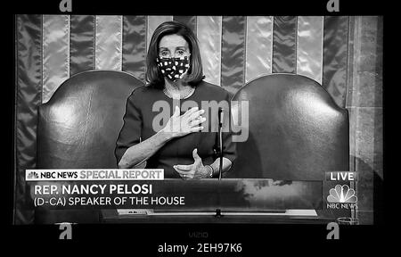 A PBS NewsHour screenshot House Speaker Nancy Pelosi addressing the Senate minutes before supporters of President Trump attacked the U.S. Capitol. Stock Photo