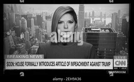 A CNN screenshot news anchor Kate Bolduan reporting that the House of Representatives will impeach President Donald Trump for the second time. Stock Photo