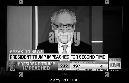 A television screenshot of CNN news anchor Wolf Blitzer announcing that U.S. president Donald Trump was impeached for the second time. Stock Photo