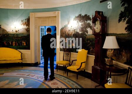 President Barack Obama pauses during a moment of silence in the Diplomatic Reception Room of the White House at 8:46AM, Sept. 11, 2010, in remembrance of the time that the first plane hit the World Trade Center in 2001. Stock Photo