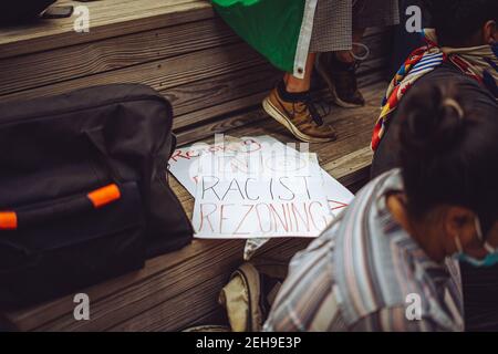 Brooklyn, USA. 15th September, 2020. Organizers with Protect Sunset Park watch testimony on a proposed rezoning at the courtyard in Industry City Stock Photo