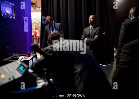 President Barack Obama closes his eyes backstage in a moment of contemplation before a rally at the University of Southern California in Los Angeles, Calif., Oct. 22, 2010. Stock Photo