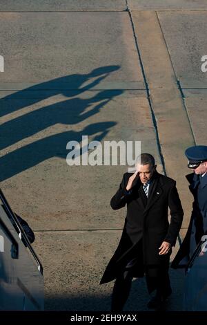 President Barack Obama salutes as he boards Air Force One at Los ...