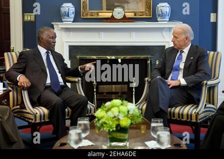 Vice President Joe Biden talks with Former President of South Africa Thabo Mbeki during a meeting with members of the African Union High Level Implementation Panel on Sudan, in his West Wing Office at the White House, April 18, 2011. Former President of Nigeria Abdulsalami Abubakar and Former President of Burundi Pierre Buyoya also attended the meeting. Stock Photo