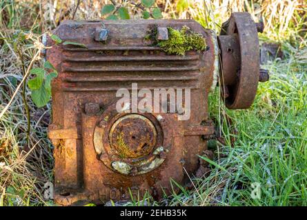 Kirkcudbright, Scotland - 28th December 2020: Old rusty Holroyd Compressor dumped at the side of the road Stock Photo