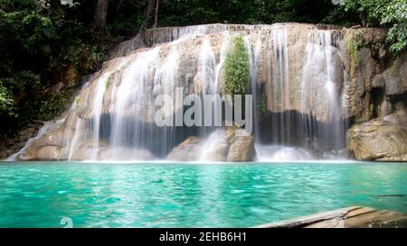 Waterfall in the jungle of northern Thailand  - Erawan Waterfalls National Park - Thailand Stock Photo