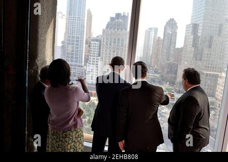 President Barack Obama and First Lady Michelle Obama, joined by New York City Mayor Michael Bloomberg, left, New York Governor Andrew Cuomo, center, and New Jersey Governor Chris Christie, tour the Port Authority of New York and New Jersey’s One World Trade Center site in New York, N.Y., June 14, 2012. Stock Photo