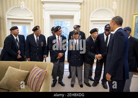 President Barack Obama greets veterans of the 2nd Ranger Infantry Company (Airborne) in the Oval Office, Feb. 27, 2013. Stock Photo