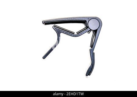 Guitar capo on White Stock Photo