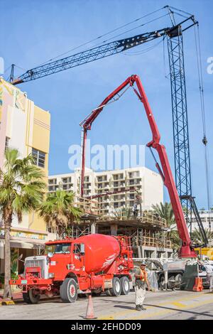 Miami Beach Florida,South Beach,Ocean Drive,cement mixer truck lorry under new construction site building,
