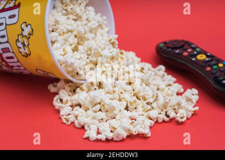 Closeup of some popcorn on a red background Stock Photo