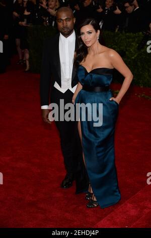 Kim Kardashian and Kanye West attend the 2014 Costume Institute Benefit at the Metropolitan Museum of Art celebrating the opening of 'Charles James: Beyond Fashion and the new Anna Wintour Costume Center' on May 5, 2014 in New York, NY, (Photo By Anthony Behar/Sipa USA) Credit: Sipa USA/Alamy Live News Stock Photo