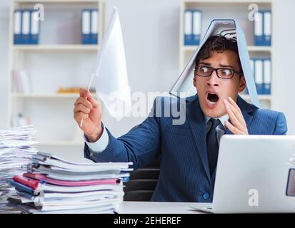 The businessman throwing white flag and giving up Stock Photo