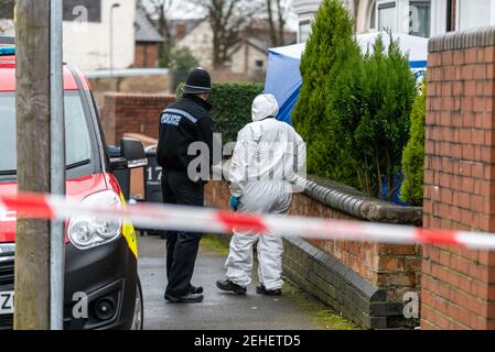 Handsworth, Birmingham, West Midlands, Uk. 19th February 2021: Forensics van on scene. An elderly man has died after a fire at a property on Church Hill Road around 5:20AM Friday morning. Forensics officers were combing the house and a blue tent sat outside the property. Credit: Ryan Underwood / Alamy Live News Stock Photo