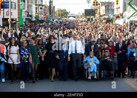 March 7, 2015 'For Presidential trips, I usually have another White House photographer accompany me so he or she can preset with the press and obtain angles that I can't, as I usually stay close to the President. Lawrence Jackson made this iconic image from the camera truck as the First Family joined others in beginning the walk across the Edmund Pettus Bridge.' Stock Photo