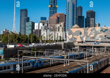 Railway tracks in front of the city skyline of Melbourne, Victoria, Australia. Stock Photo