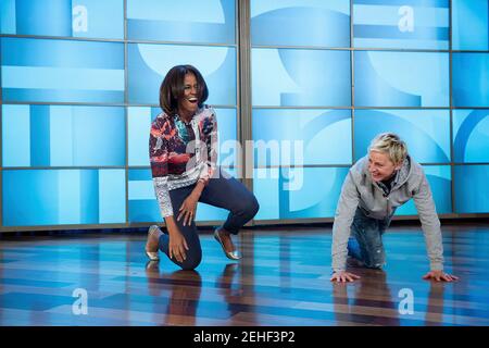 First Lady Michelle Obama rehearses with Ellen DeGeneres for a #GimmeFive 'Let's Move!' dance, prior to a taping of The Ellen DeGeneres Show in Burbank, Calif., March 12, 2015. Stock Photo