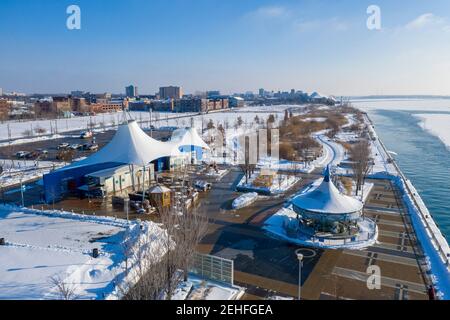 Detroit, Michigan, USA. 19th Feb, 2021. Cullen Plaza and Milliken State Park in winter. Milliken State Park is an urban park on the Detroit River near downtown Detroit. Credit: Jim West/Alamy Live News Stock Photo