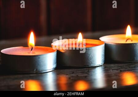 Three candle lights at home Stock Photo