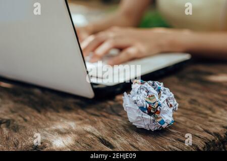 A Crumpled paper on the table. Fail, bad, no idea concept. Stock Photo