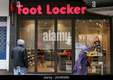 London, UK. 19th Feb, 2021. People walk past a branch of Foot Locker in London. Non-essential retail businesses are currently closed during the national lockdown. Credit: SOPA Images Limited/Alamy Live News Stock Photo