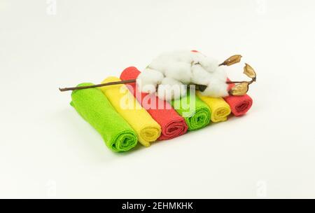 A pile of fresh microfibre rags lie on the white table in the kitchen Stock Photo