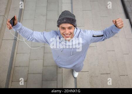 Successful happy smiling young latin man fitness sport sports joy pleasure outdoor Stock Photo