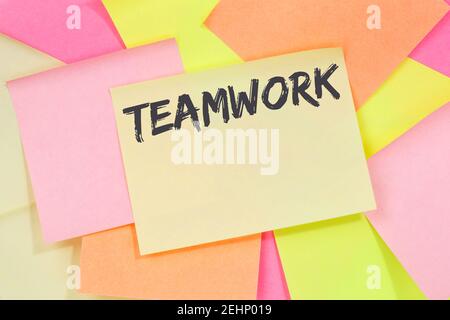 Teamwork team working together success business concept note paper notepaper Stock Photo