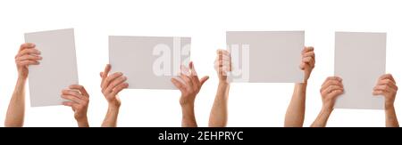 Set of four A4 sheets holding with both hands with white isolated background Stock Photo