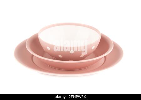 Plastic plates and bowls isolated on white background. Stock Photo